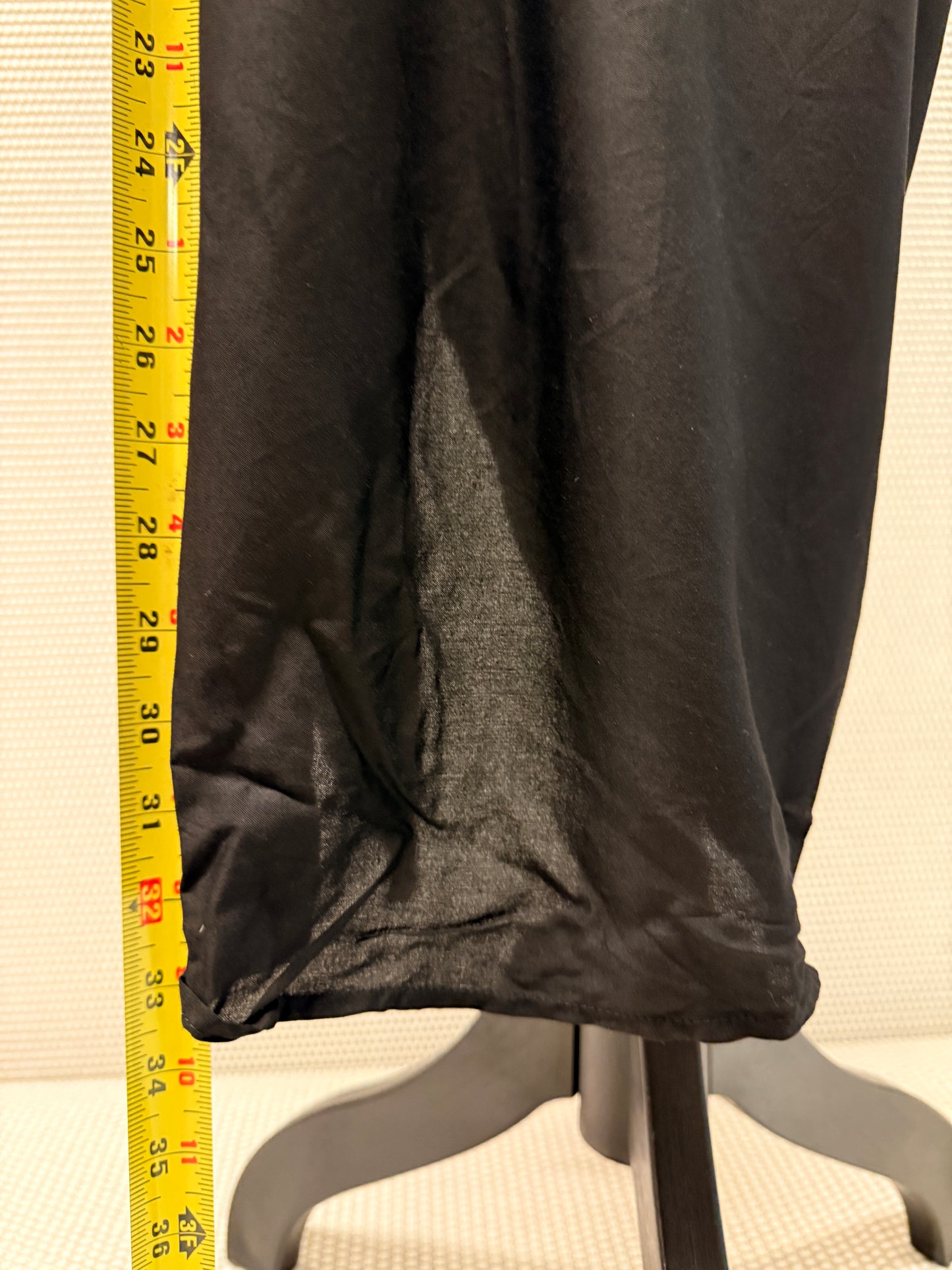 Elan “Black Ruched Cover-Up Skirt” — New with Tags. Resort retail $48.