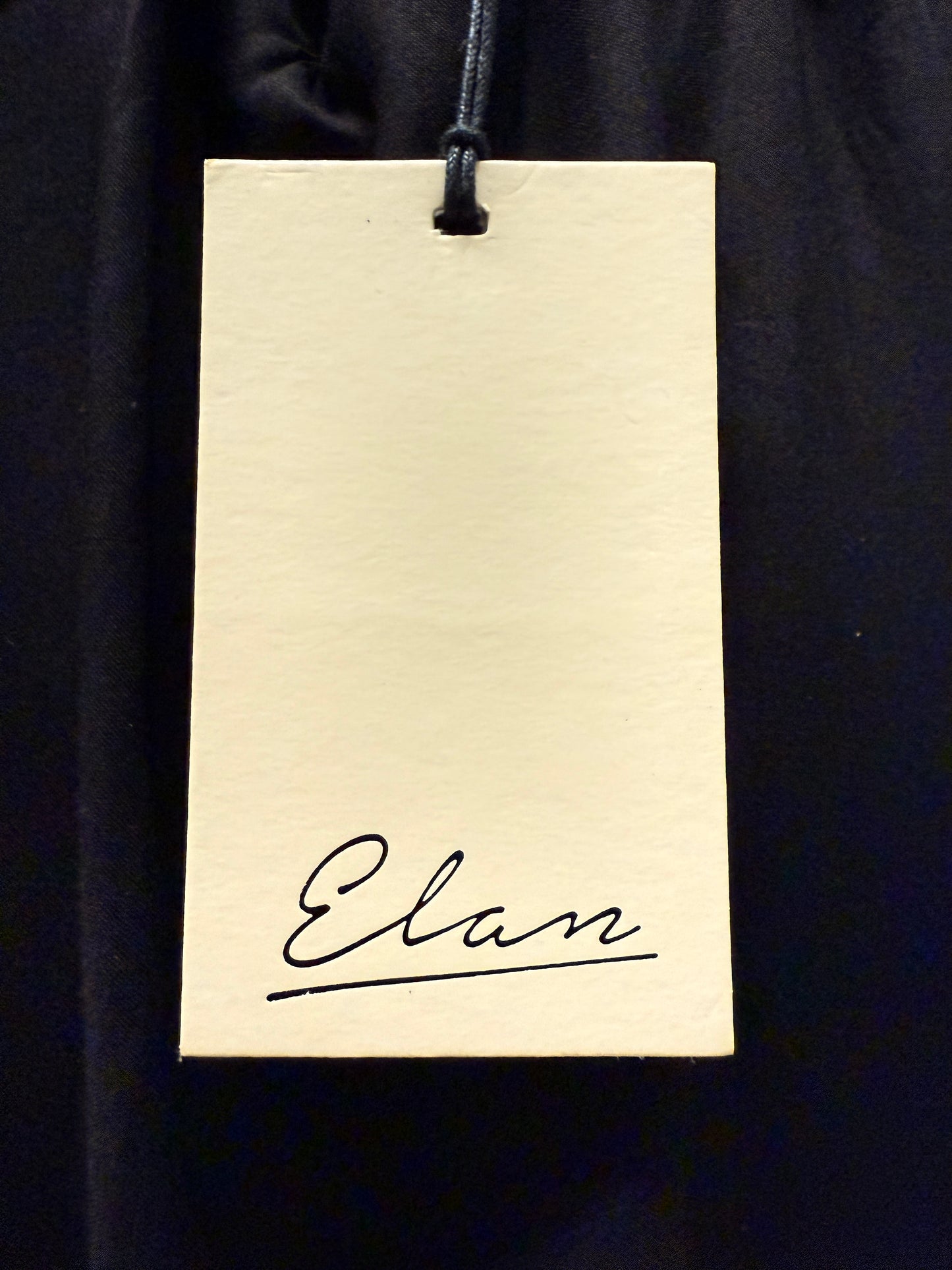 Elan “Black Ruched Cover-Up Skirt” — New with Tags. Resort retail $48.